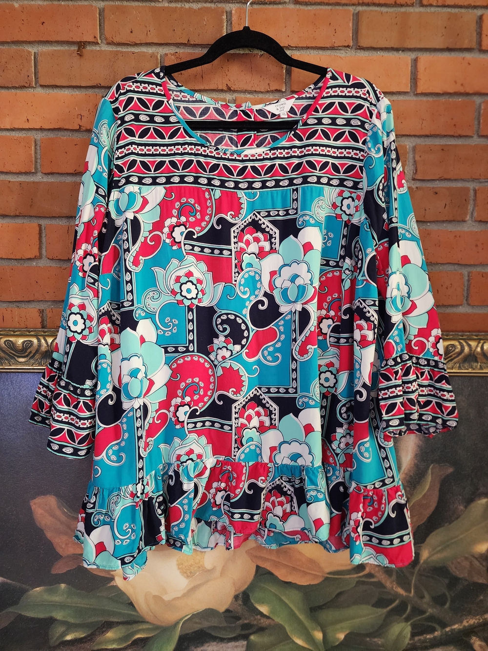 crown & ivy Floral Geometric Ruffle Hem Blouse in Teal, Coral and Navy